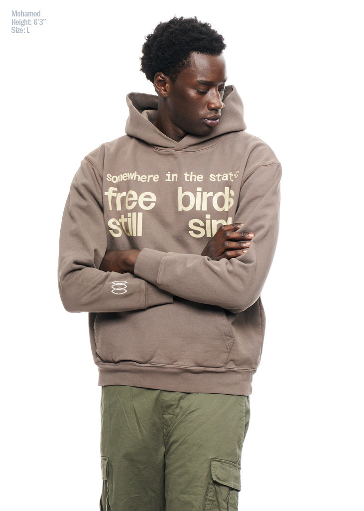 FREE BIRDS SING STATEMENT HOODIE