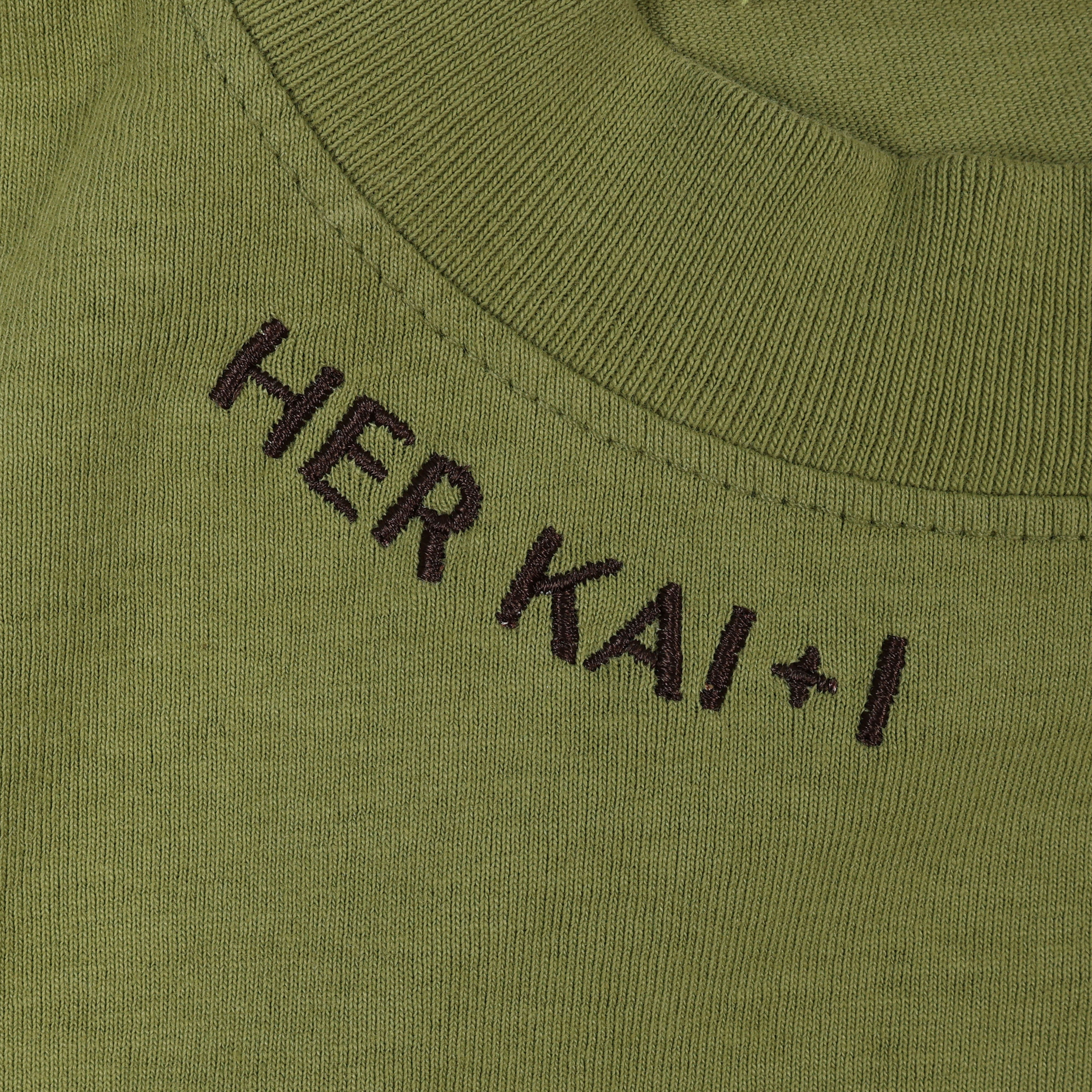 Detail View of Her Kai & I Logo embroidery along neckline