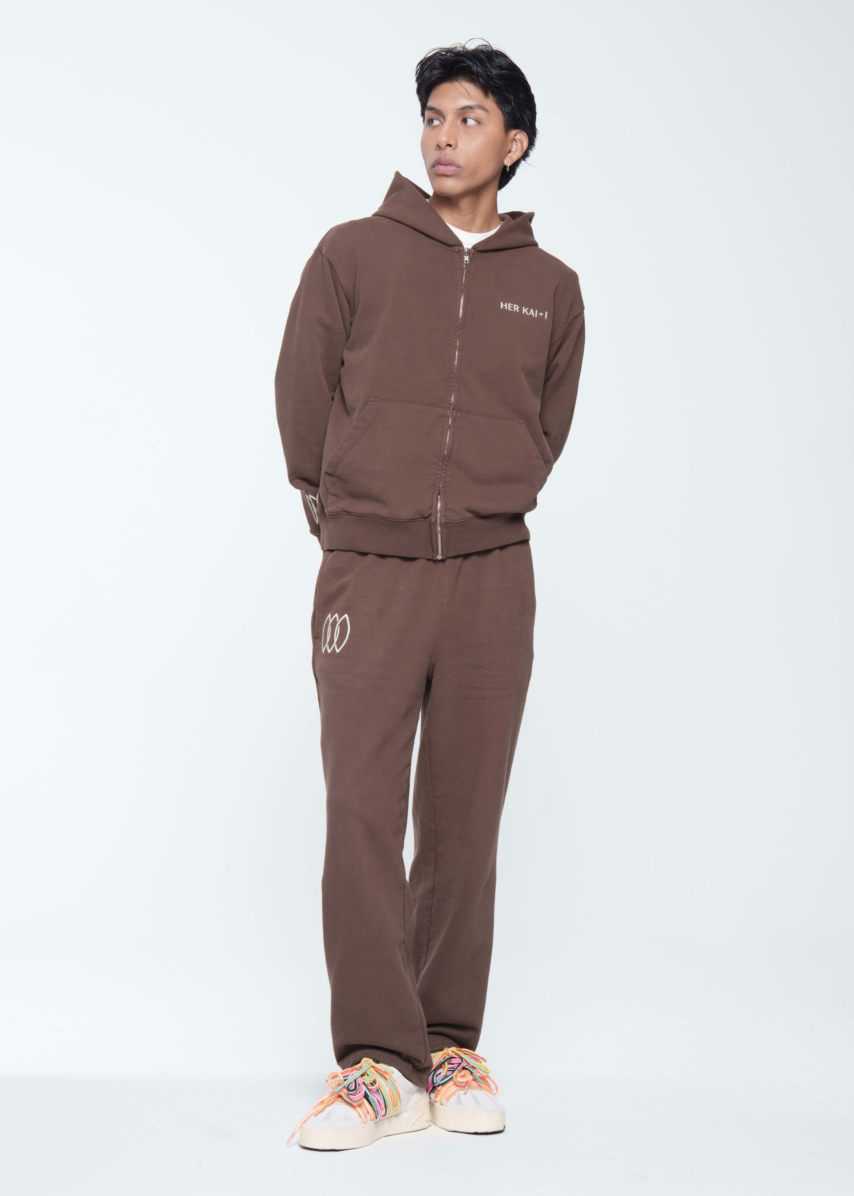 Model is wearing size Medium in Forever Connected Sweatsuit in Brown