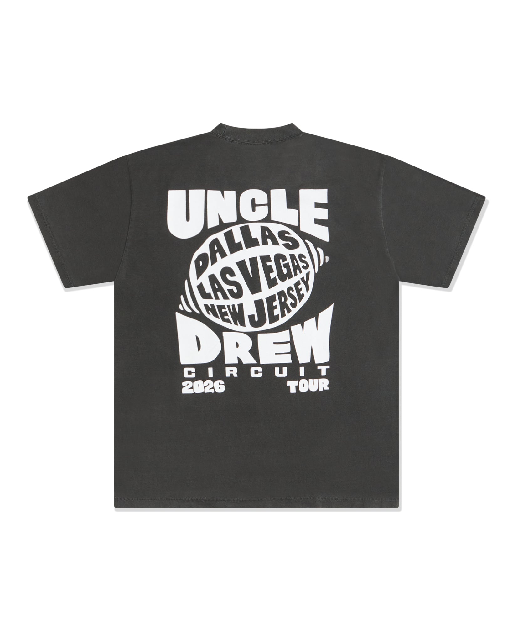 A dark gray crewneck t-shirt with a large white graphic print on the back, featuring the text 'UNCLE DREW' and 'PALLAS LAS VEGAS NEW JERSEY CIRCUIT 2025 TOUR'.