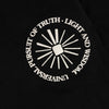 DETAIL VIEW OF UNIVERSAL PURSUIT OF TRUTH, LIGHT, AND WISDOM TEXT GRAPHIC