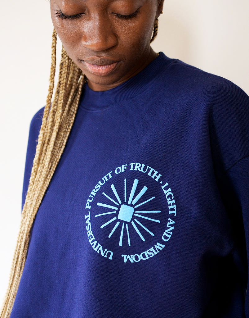 Detail shot of Universal Pursuit Graphic Puff Print on Model