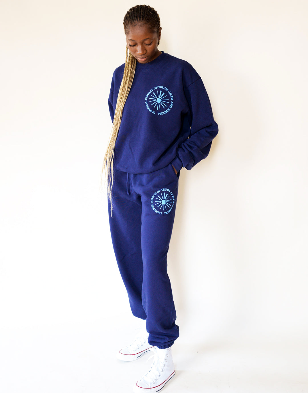 Model wears Universal Pursuit Sweatpants in size Small. 100% Cotton Sweatpants in Waves Deep
